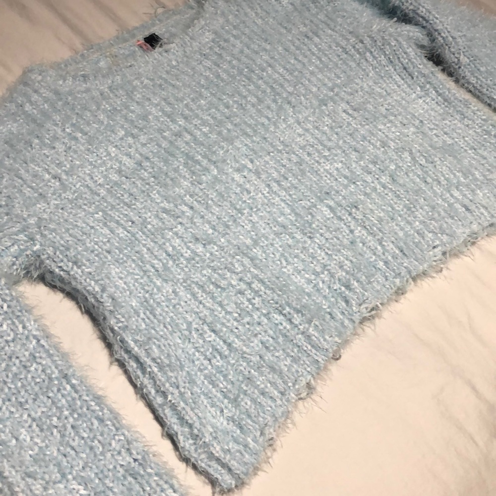 Cute light blue sweater!